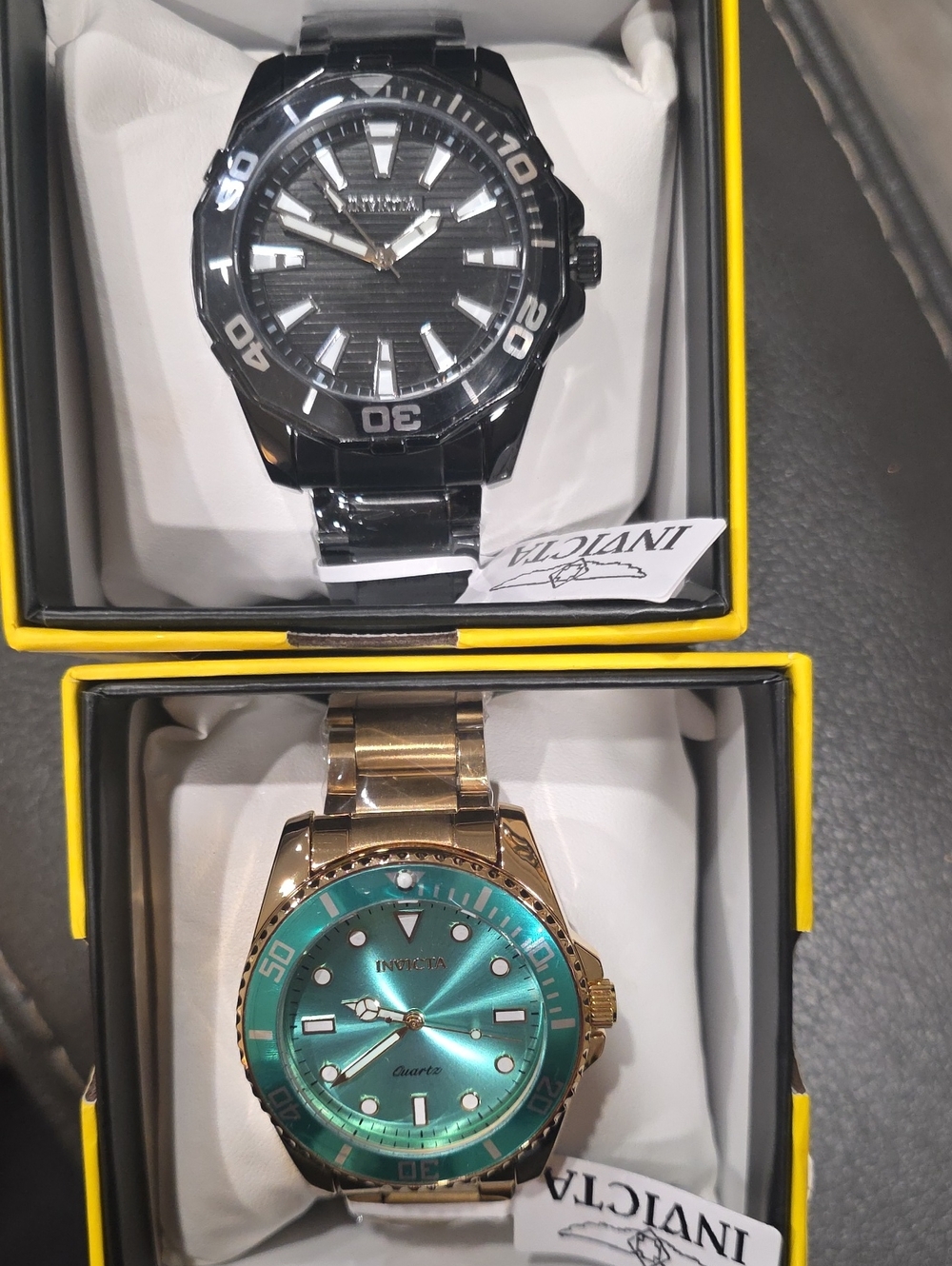 721.  Pair Of Men's Invicta Watches